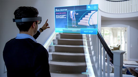 A thyssenkrupp Elevator technician uses Skype for HoloLens to get remote, hands-free access to technical and expert information while on site